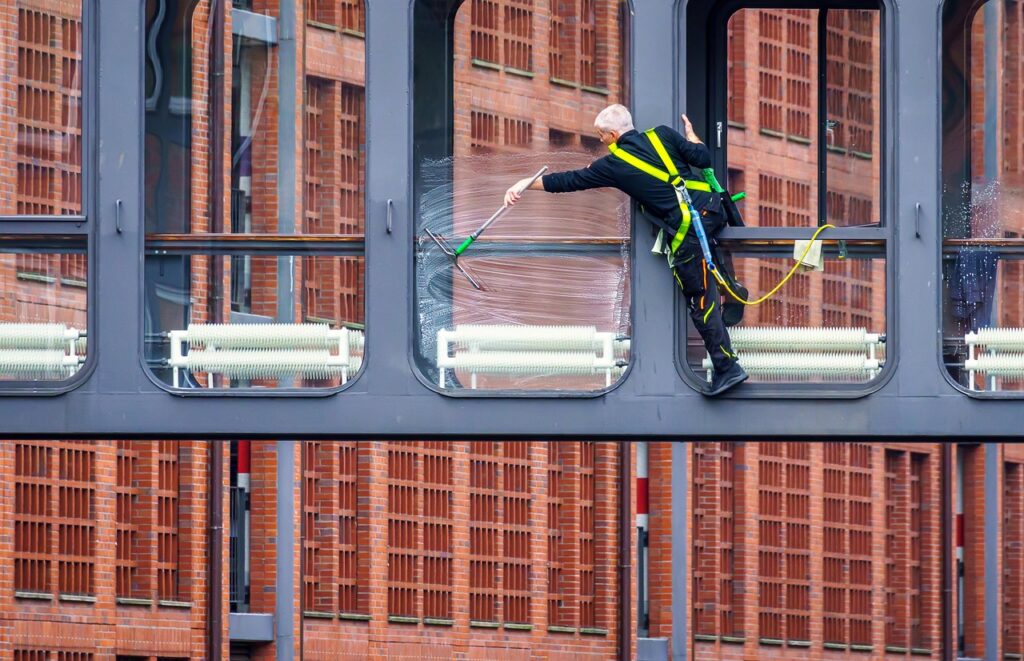 glass cleaning, clean windows, workers, building, danger, upside down, security, mini jobbers